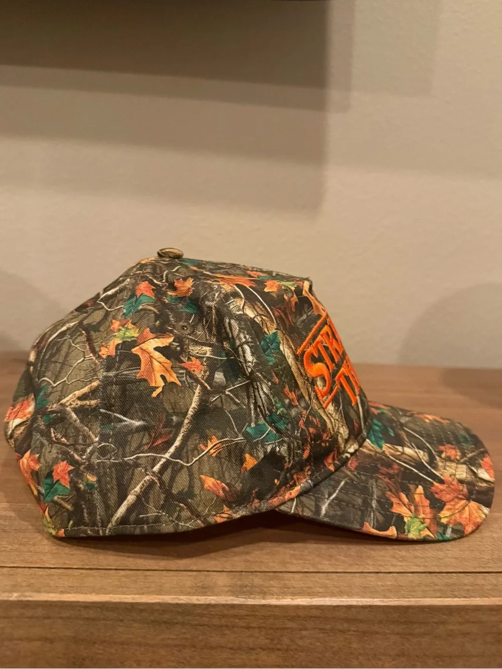 Stranger Things hard to find bright orange and camo embroidered SnapBack hat